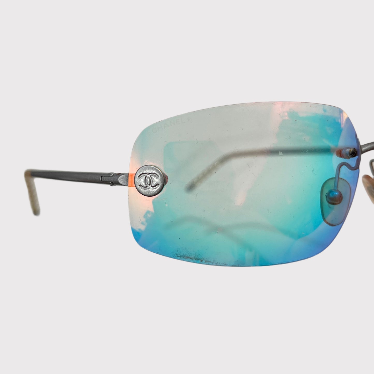 Chanel iridescent rimless sunglasses